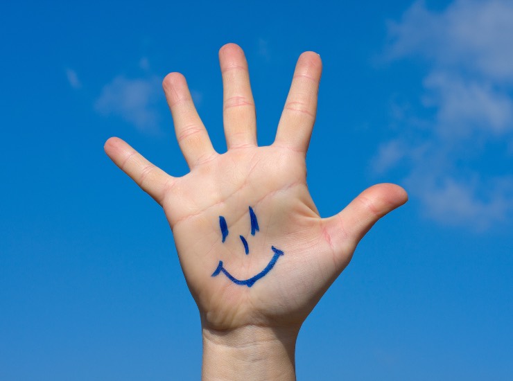 Hand with smile